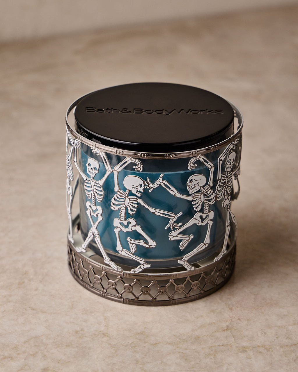 Glow-in-the-Dark Dancing Skeleton 3-Wick Candle Holder